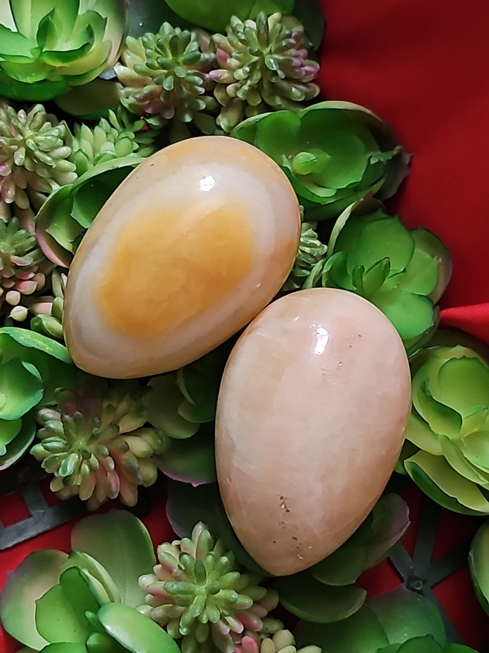 Pair Decorative Life-size Yellow and Cream Polished Stone Eggs